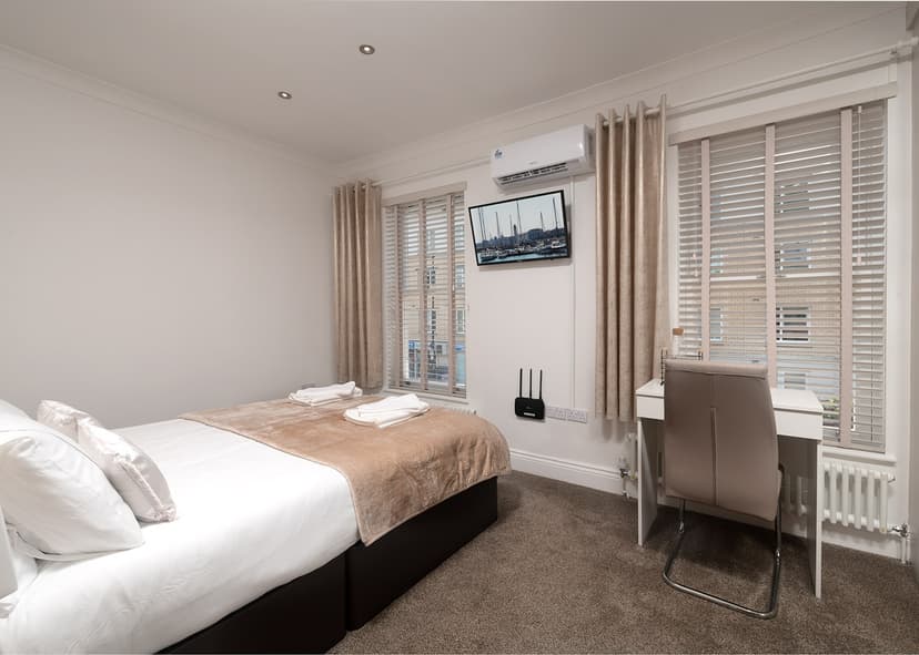 Stylish guest bedroom with comfort amenities in London