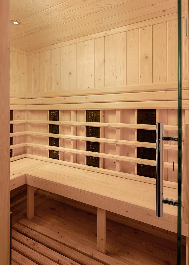 Traditional Finnish sauna interior with bench seating in London